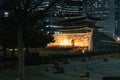 Sungnyemun Gate or Namdaemun Gate and Fortress Wall during winter night at Jung-gu , Seoul South Korea : 6 February 2023 Royalty Free Stock Photo