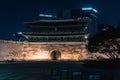 Sungnyemun Gate or Namdaemun Gate and Fortress Wall during winter night at Jung-gu , Seoul South Korea : 6 February 2023
