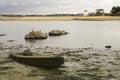 Sunk boat in the low tide