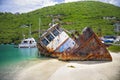 Sunk boat in the tropics Royalty Free Stock Photo