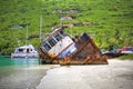 Sunk boat in the tropics Royalty Free Stock Photo