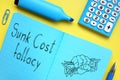 Sunk cost fallacy is shown on the conceptual photo using the text Royalty Free Stock Photo