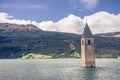 Sunken church tower in lake in the alps