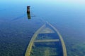 Sunken fishing boat abandoned in the sea