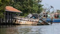 Sunken fishing trawler in the backwaters of Kerala, India Royalty Free Stock Photo