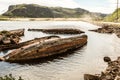 Sunken old wooden fishing boats in Teriberka, Murmansk Oblast, Russia Royalty Free Stock Photo