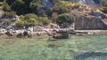 The sunken ruins on the island of Kekova Dolichiste of the ancient Lycian city of ancient Simena, was destroyed by an earthquake, Royalty Free Stock Photo