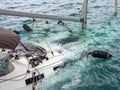 Sunken sailing ship during the Mediterranean cyclone Ianos in Nidri Royalty Free Stock Photo
