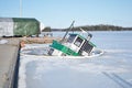 Sunken ship in the Lappeenranta harbor at winter.