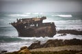 Sunken ship stranded at Cape Agulhas in South Africa, this place divides two oceans