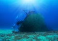A sunken shipwreck with a scuba diver Royalty Free Stock Photo