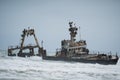 Sunken trawler, shipwreck. Old rusty metal ship Zeila at Skeleton Coast Namibia.