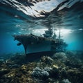 sunken warship lying on the bottom of the ocean among corals Royalty Free Stock Photo