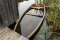 Sunken wooden boat, near the shore