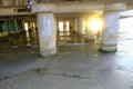 Sunlight across the columns of the piers of the Rotonda al mare in Senigallia, Italy. Beach Landscape