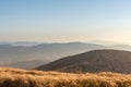 Sunlight autumn in the mountains. Big meadows on the mountain peaks. Royalty Free Stock Photo