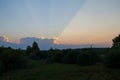 Sunlight bit through the great cloud.