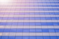 Sunlight on blue glass wall surface of modern high office building Royalty Free Stock Photo