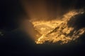 Rays of sun coming out of dark clouds Royalty Free Stock Photo