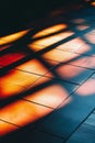 Sunlight Casting Colorful Patterns on Tiled Floor in a Modern Interior Setting Royalty Free Stock Photo