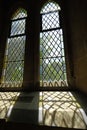 Sunlight Casting Diamond Patterned Shadows Through Church Window Royalty Free Stock Photo
