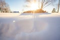 sunlight casting shadows on a snowdrift Royalty Free Stock Photo