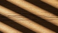 Casts diagonal shadows on a textured wooden surface revealing the Royalty Free Stock Photo