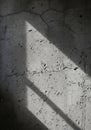 Sunlight casts shadows through a rectangular Royalty Free Stock Photo