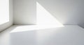 Sunlight casts a triangular shadow on a smooth, white surface surrounded by two intersecting white Royalty Free Stock Photo