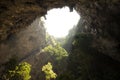 Sunlight through a cave hole in Thailand.