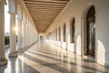 Sunlight through columns in white corridor Royalty Free Stock Photo
