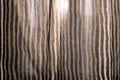 Sunlight coming through a window and fine striped fabric - minimal, simplicity