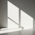 Sunlight creates geometric shadows through a window, casting Royalty Free Stock Photo