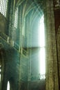 Sunlight crossing through a big window or showcase inside of Saint Bavo Cathedral Sint-Baafskathedraal in Ghent, Belgium