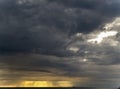 Sunlight and Dark rain clouds look awesome at the beach