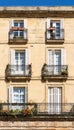 Sunlight on facade of classic building in Bilbao old town street Royalty Free Stock Photo