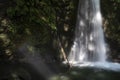 Sunlight falling onto the Salto do Prego waterfall in Faial da Terra, Sao Miguel