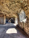 Sunlight falling into underground vault made of rocks