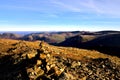 Sunlight on the marker cairn of Dove Crag