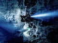 Sunlight illuminates a diver underwater in the cavern at Buford Sink, Chassahowitzka Wildlife Management Area, Florida Royalty Free Stock Photo