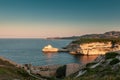 Sunlight on lighthouse at entrance to Bonifacio harbour in Corsica Royalty Free Stock Photo