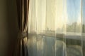 Sunlight in morning day through white curtain on window Royalty Free Stock Photo