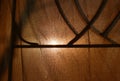 Sunlight through old curtain and wrought iron curve on window frame Royalty Free Stock Photo