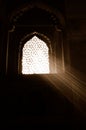 Sunlight through ornate window