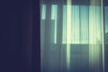 Sunlight from outside raying through the white curtain and wooden window to living room in the morning. Royalty Free Stock Photo