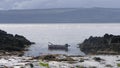 Sunlight over a Fishing boats and equipment at Greencastle Harbour Donegal Royalty Free Stock Photo