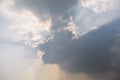 Sunlight rays coming out between the clouds Royalty Free Stock Photo
