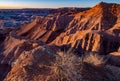 Sunlight reflected on steep rock faces in Little Painted Desert, Arizona, USA