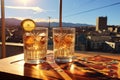 sunlight reflecting off pisco-filled glasses on a bright day