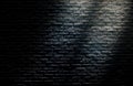 Sunlight shading shadow on empty space black brick wall grunge texture background. Royalty Free Stock Photo